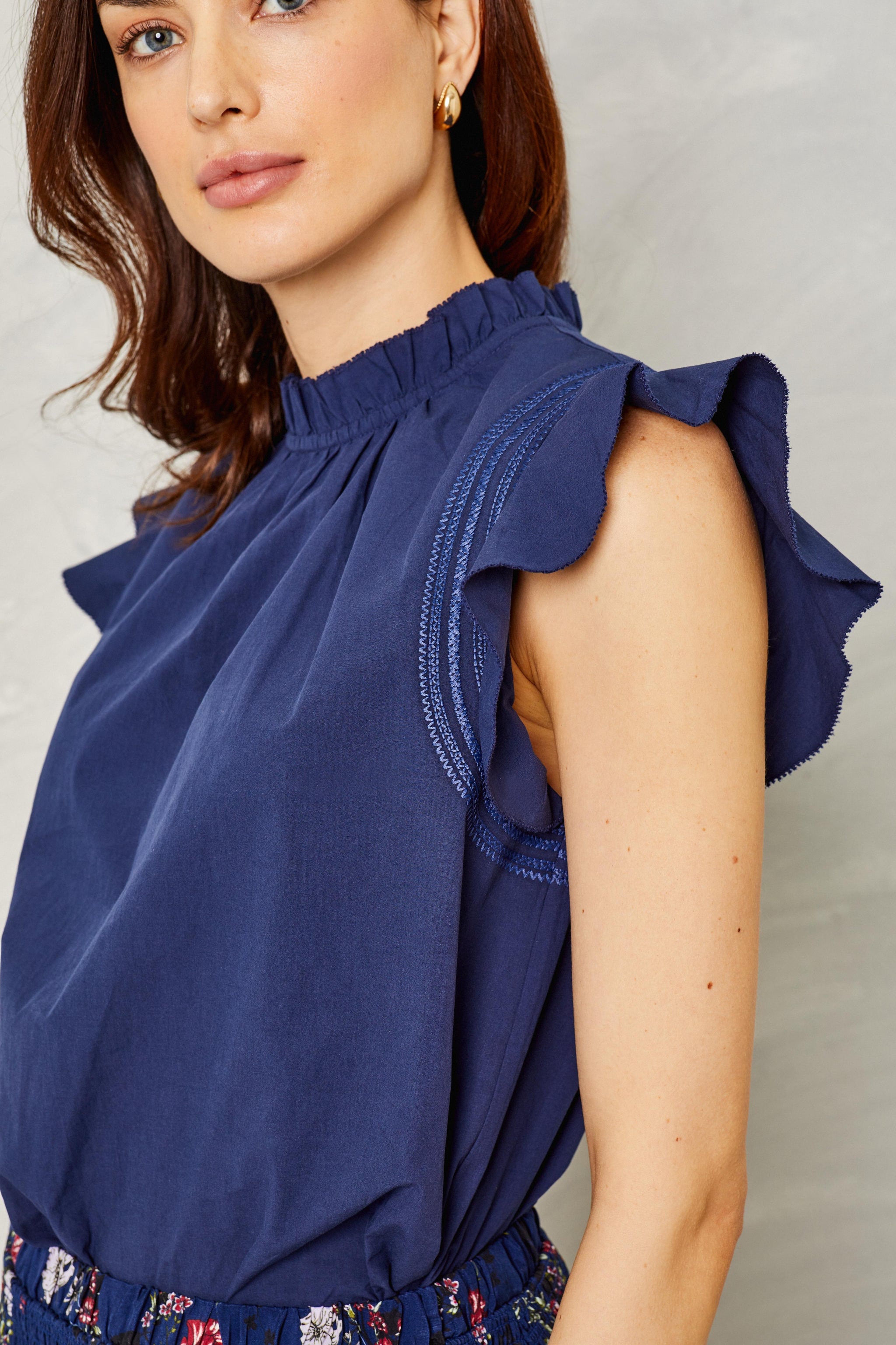 navy blue ruffle top